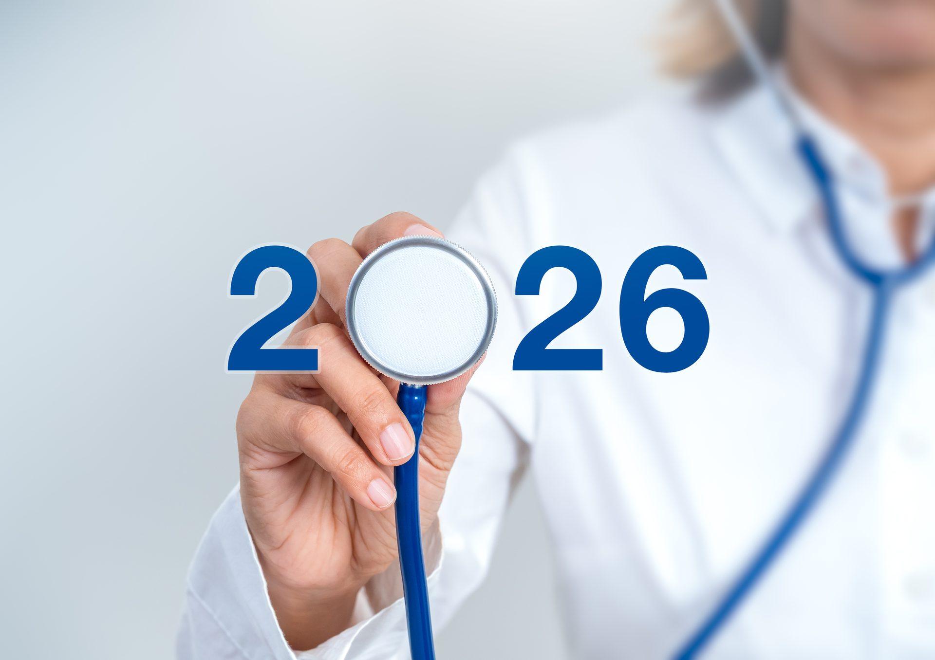 Lekarz w białym kitlu ze stetoskopem i cyfrą 2026